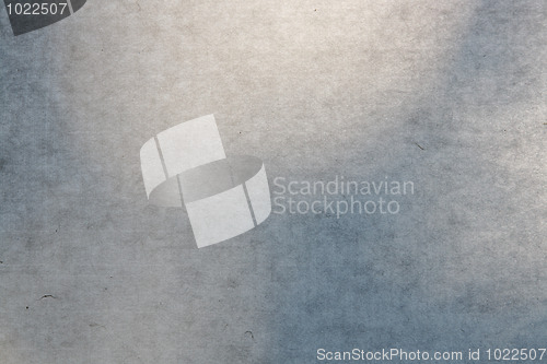 Image of backlit background of textured paper