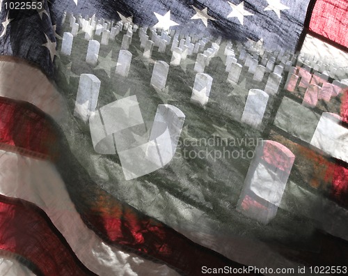 Image of American flag and military cemetery