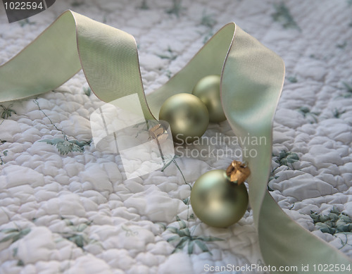 Image of green ornaments and ribbon