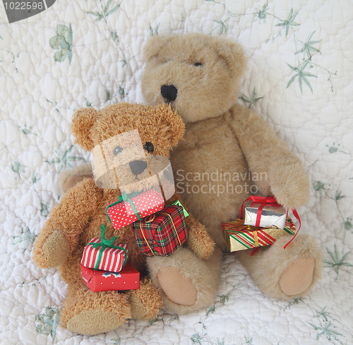 Image of teddy bears with Christmas presents