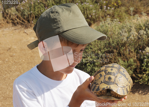 Image of Boy and Turtle