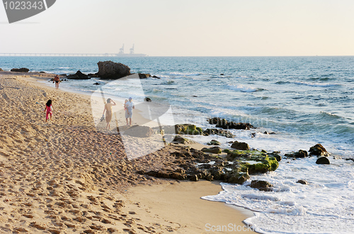 Image of Walking along the beach 