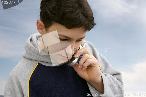 Image of Boy on the phone