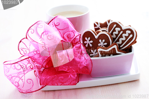 Image of cup of coffee with cookies