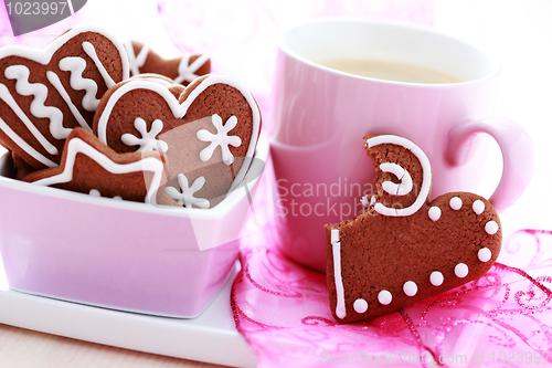 Image of cup of coffee with cookies