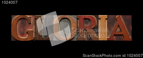 Image of the word gloria on black