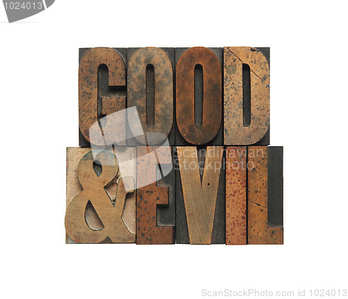 Image of good and evil in old wood type