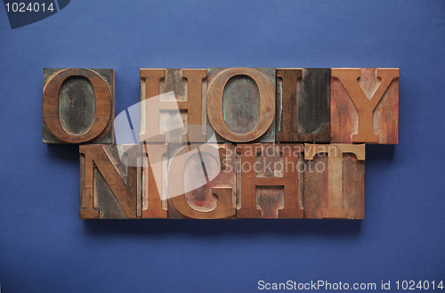 Image of o holy night in old wood type