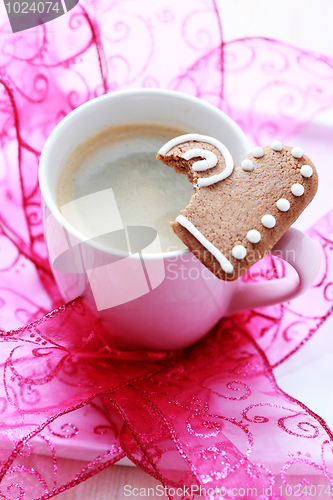 Image of cup of coffee with cookie