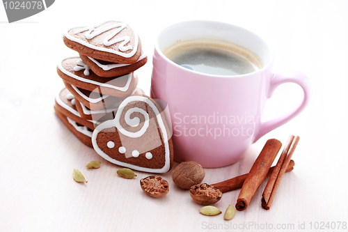 Image of cup of coffee with cookies