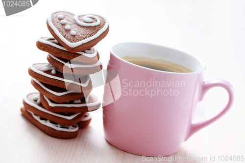 Image of cup of coffee with cookies