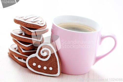 Image of cup of coffee with cookies