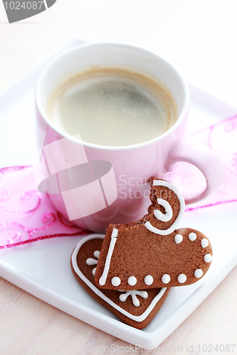Image of cup of coffee with cookie