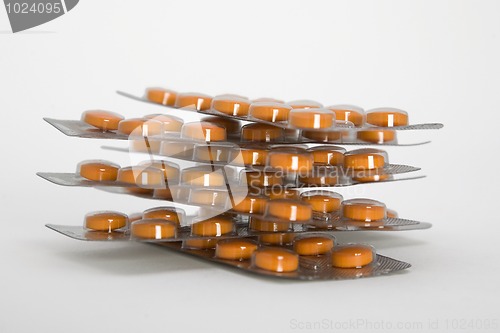 Image of Packs of orange pills