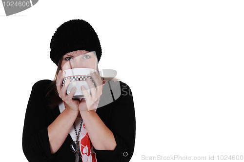 Image of Girl drinking tee.