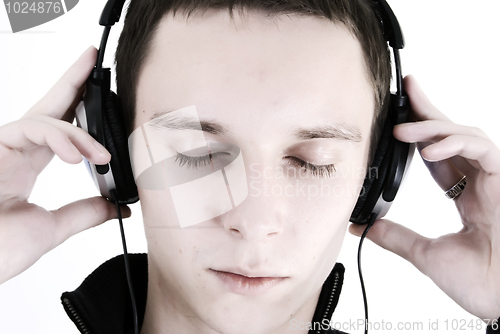 Image of Young man in headphones   