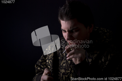 Image of portrait of a young man with cigarette