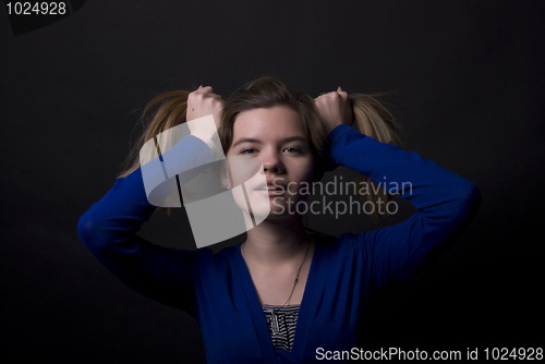 Image of Girl with two ponytails    