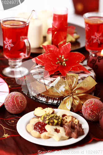 Image of Marchpane cake with wine punch and cookies