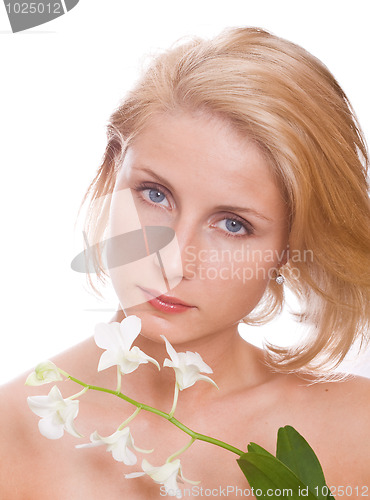 Image of beautiful woman with white flower 