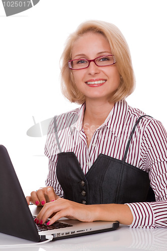 Image of young business woman working at her laptop 