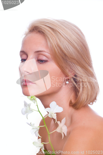 Image of beautiful woman with white flower 