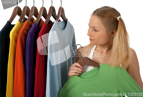 Image of Young woman in a clothing store