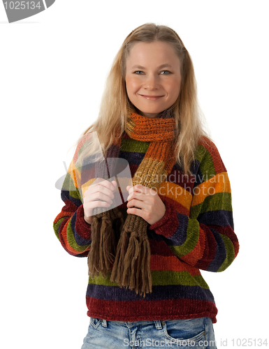 Image of Smiling young woman wearing striped sweater