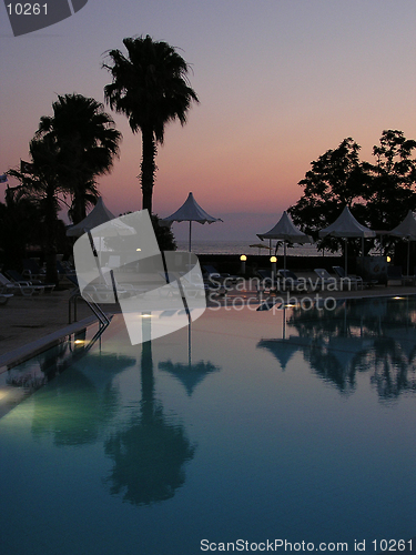 Image of Swimming pool at sunset