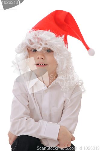 Image of child in a hat santa claus