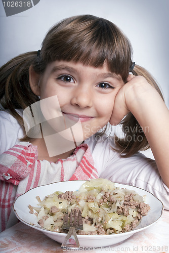Image of Girl enjoying her lunch