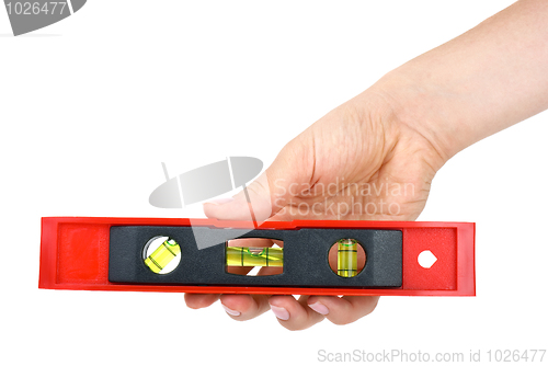 Image of Hand holding small clinometer
