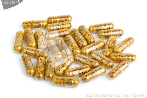 Image of Pile of homeopathic pills with bee pollen