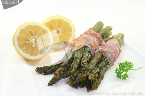 Image of green asparagus in bacon coat