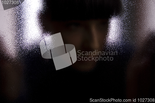 Image of Girl behind the glass    