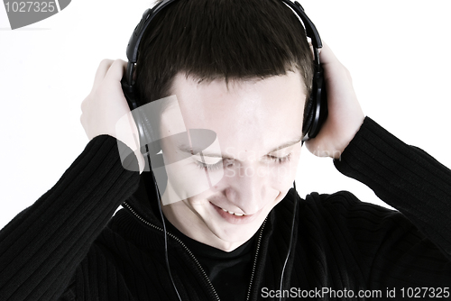 Image of Young man in headphones   