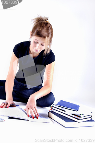 Image of girl spending time in studying 