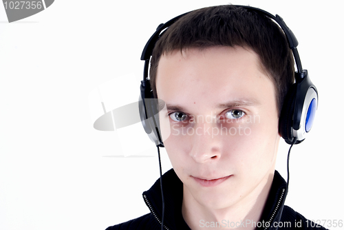 Image of Young man in headphones   