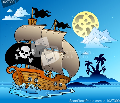 Image of Pirate sailboat with island silhouette