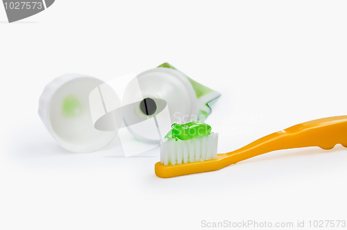 Image of A toothbrush with a tube