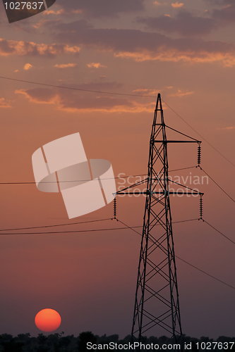 Image of Electricity pylon at sunset