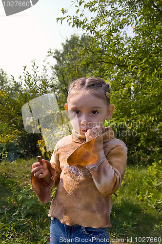 Image of Girl eating chocolate