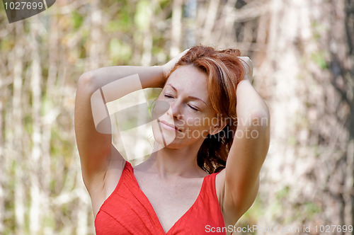 Image of Portrait of woman in nature