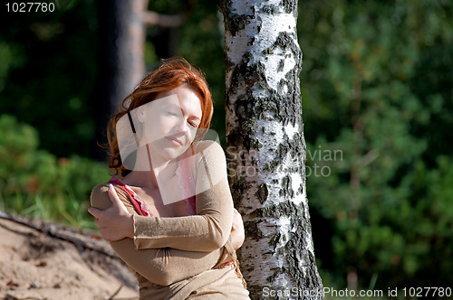Image of Woman at the birch