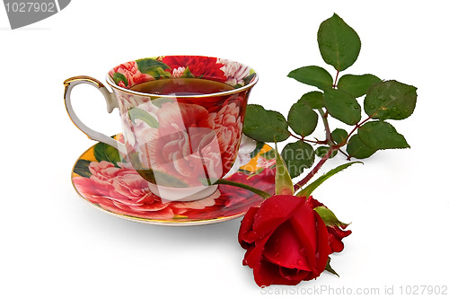 Image of Tea in a cup with a rose