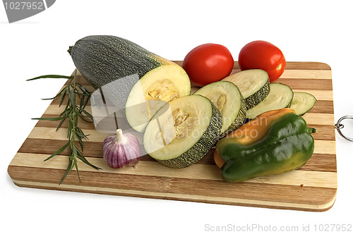 Image of Zucchini with vegetables on the board