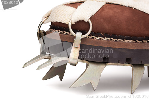 Image of Boot and Steel Crampon isolated