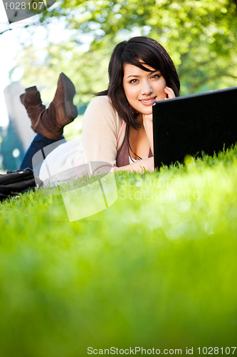 Image of Mixed race college student with laptop