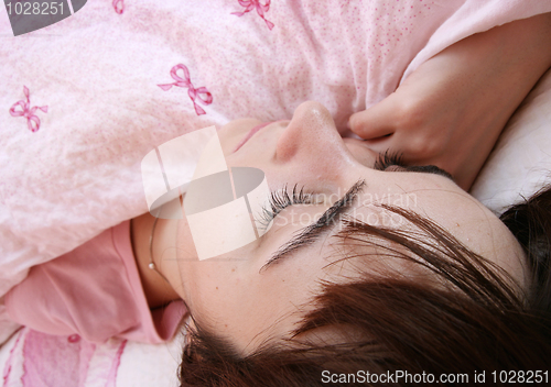 Image of Beautiful young woman sleeping.