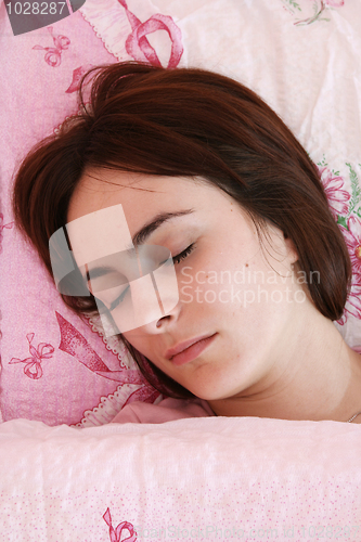 Image of Beautiful young woman sleeping.